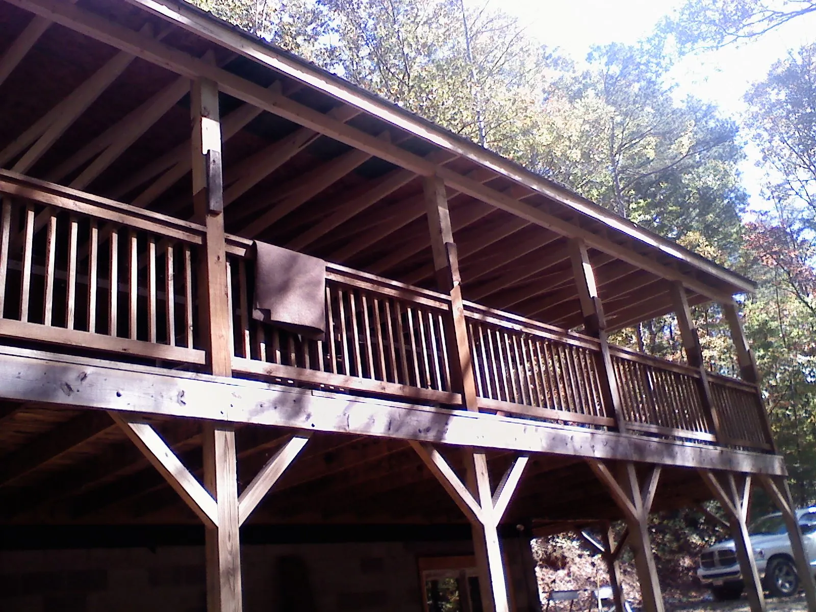 Timber framing under a new elevated porch and deck — Roof Leak Repair in Sioux Center by Roofing Brothers
